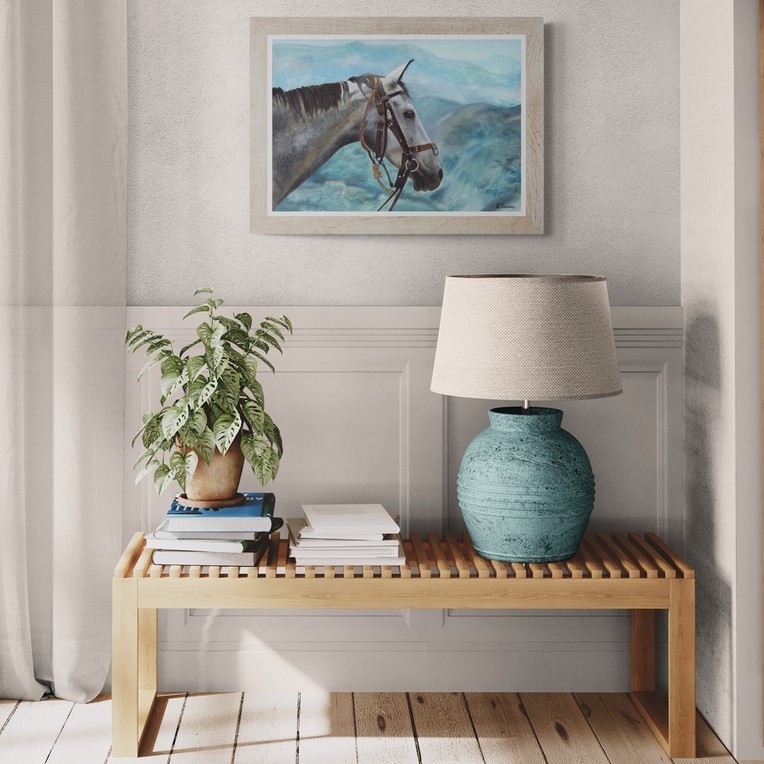  Horse portrait painting wall art decor in a living room above a small table by wildlife artist Laurence Saunois