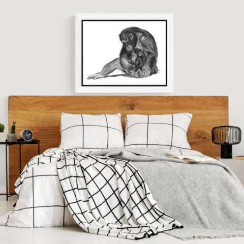 AVAILABILITY Charcoal artwork of a mother chimpanzee and her baby displayed above a bedroom bed – wildlife artist Laurence Saunois