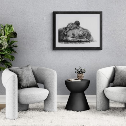 AVAILABILITY Charcoal artwork of a female gorilla and her baby displayed in a living room – wildlife artist Laurence Saunois
