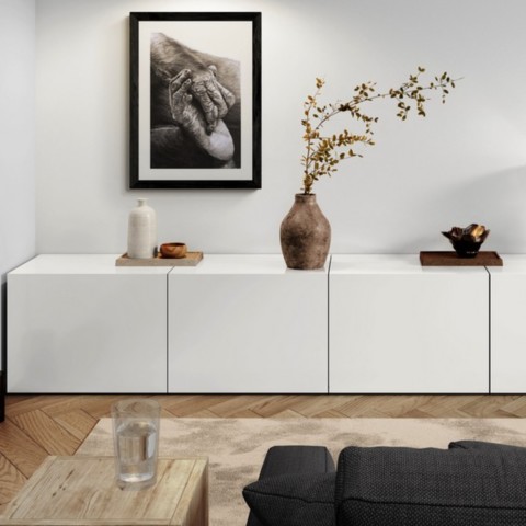 AVAILABILITY Charcoal artwork of a bonobo foot and hand displayed above a living room cabinet – wildlife artist Laurence Saunois
